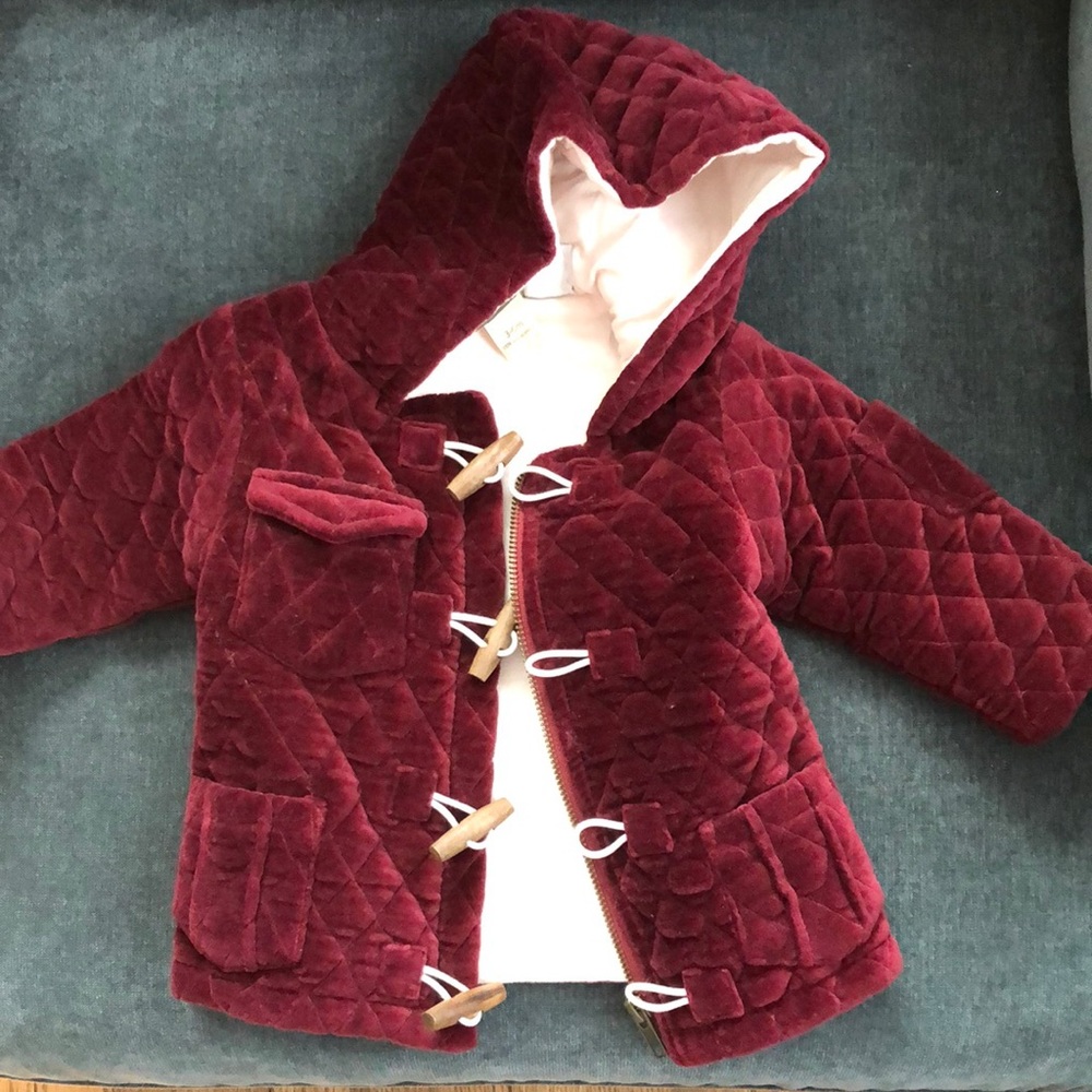 Maroon or burgundy quilted baby/kid coat.